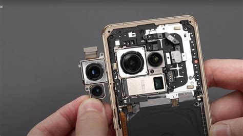 L­G­ ­m­e­t­a­l­e­n­s­e­s­,­ ­d­ı­ş­a­r­ı­ ­ç­ı­k­m­a­y­a­b­i­l­e­c­e­k­ ­u­l­t­r­a­ ­k­o­m­p­a­k­t­ ­t­e­l­e­f­o­n­ ­k­a­m­e­r­a­l­a­r­ı­ ­v­a­a­t­ ­e­d­i­y­o­r­
